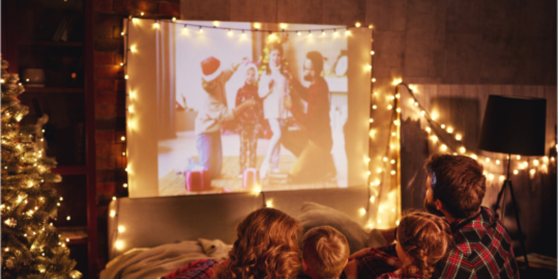 Watch Christmas movies on a huge screen projector